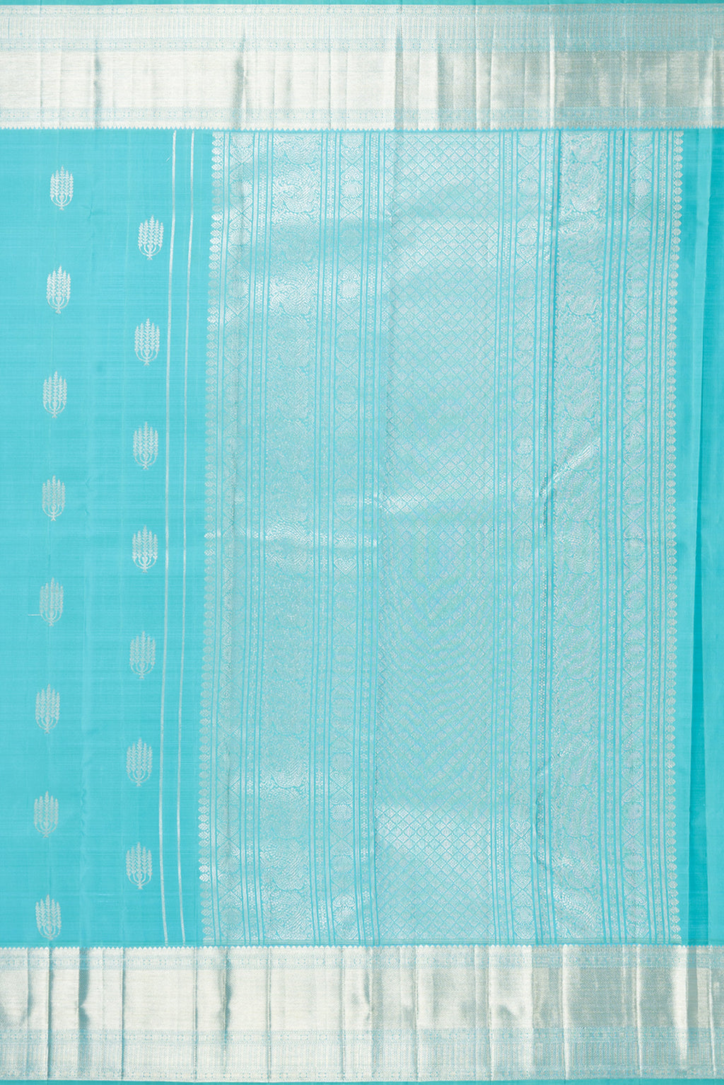 Close up image of the pallu of Pure Silk Turquoise Kanjivaram Saree with Zari Butta on the body and Zari Border. 