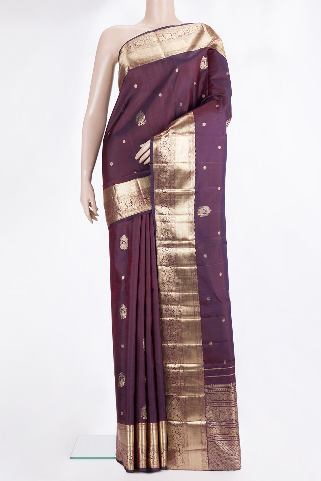 Pure Silk Burgundy Dual Tone Kanjivaram Saree with Zari Butta on the body and Zari Border.  displayed on a mannequin