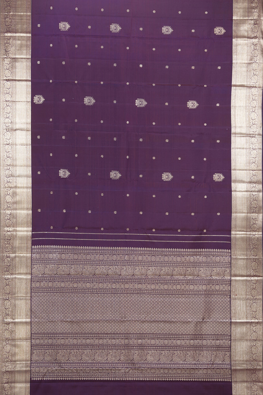 Flat view of Pure Silk Burgundy Dual Tone Kanjivaram Saree with Zari Butta on the body and Zari Border. 