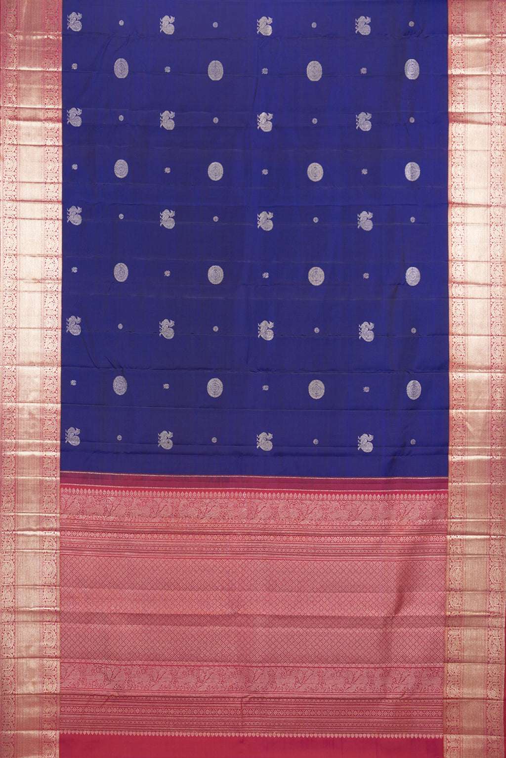 Flat view of Pure Silk Navy Blue Dual Tone Kanchipuram Saree with Zari Butta on the body and Zari Border. 