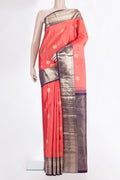 Pure Silk Brick Orange Kanchipuram Saree with Zari Butta on the body and Zari Border.  displayed on a mannequin