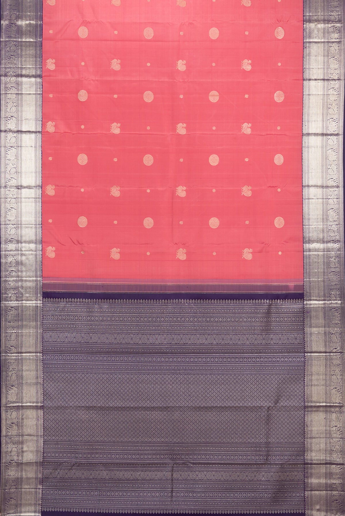 Flat view of Pure Silk Brick Orange Kanchipuram Saree with Zari Butta on the body and Zari Border. 