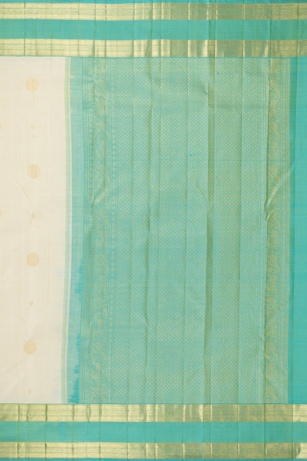 Close up image of the pallu of Pure Silk Cream Kanchipuram Saree with Zari Butta on the body and Zari Border. 