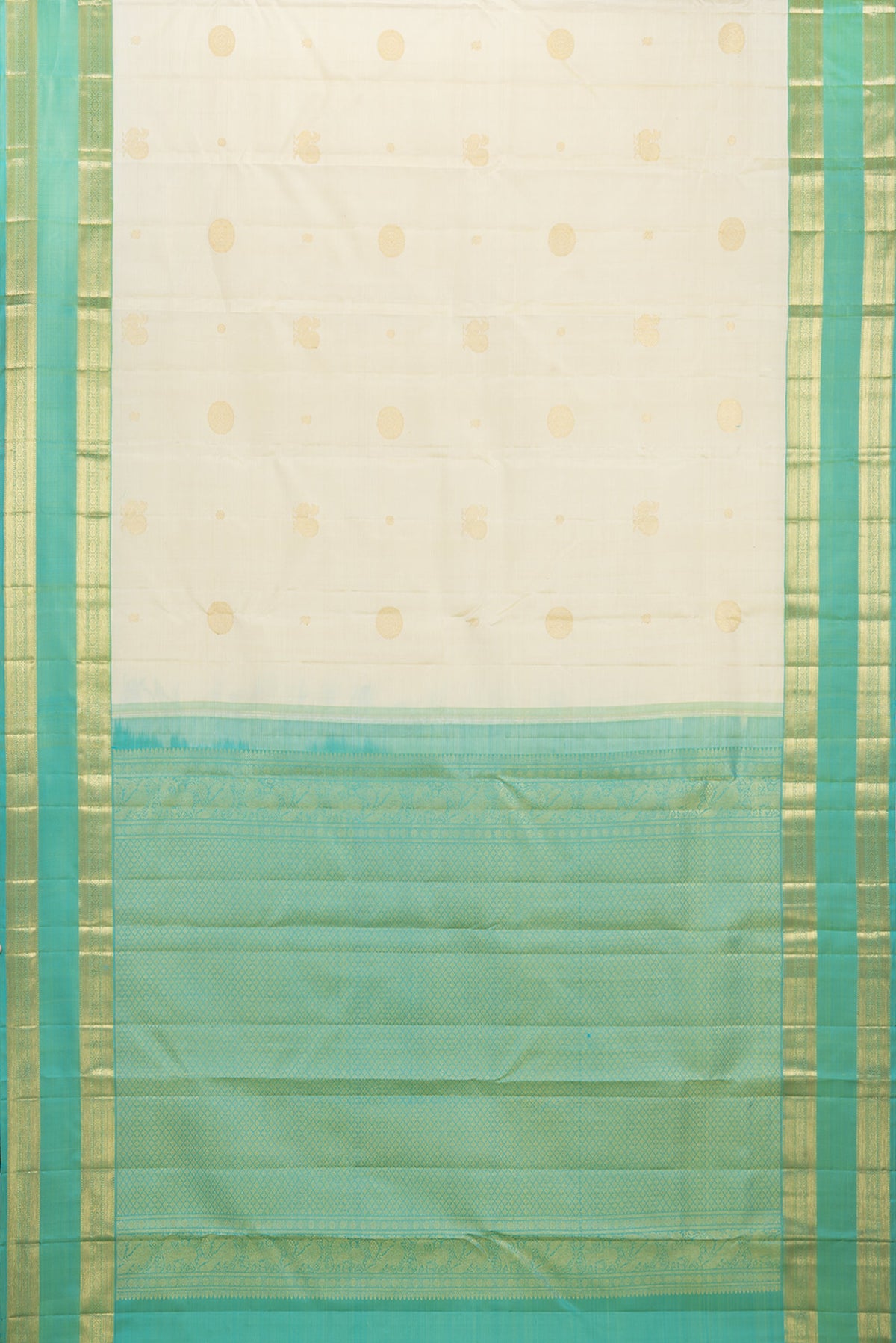 Flat view of Pure Silk Cream Kanchipuram Saree with Zari Butta on the body and Zari Border. 