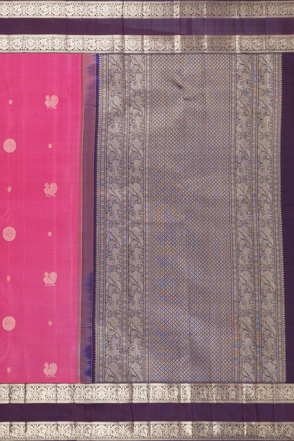 Close up image of the pallu of Pure Silk Pink Dual Tone Kanchipuram Saree with Zari Butta on the body and Zari Border. 
