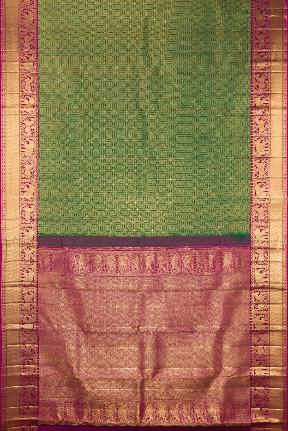 Flat view of Pure Silk Bottle Green Kanjivaram Saree with Zari Brocade on the body and Fancy Border. 
