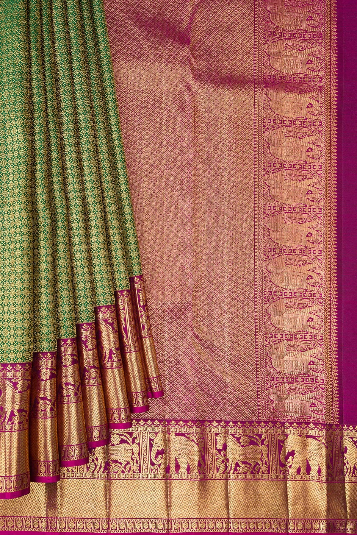 Pleats and pallu of Pure Silk Bottle Green Kanjivaram Saree with Zari Brocade on the body and Fancy Border. 