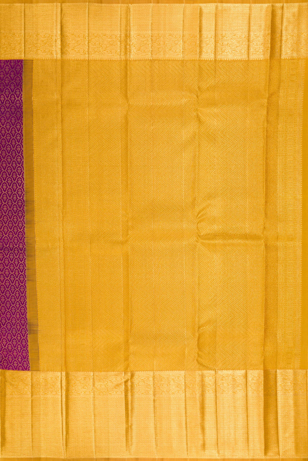 Close up image of the pallu of Pure Silk Magenta Kanchipuram Saree with Zari Brocade on the body and Zari Border. 