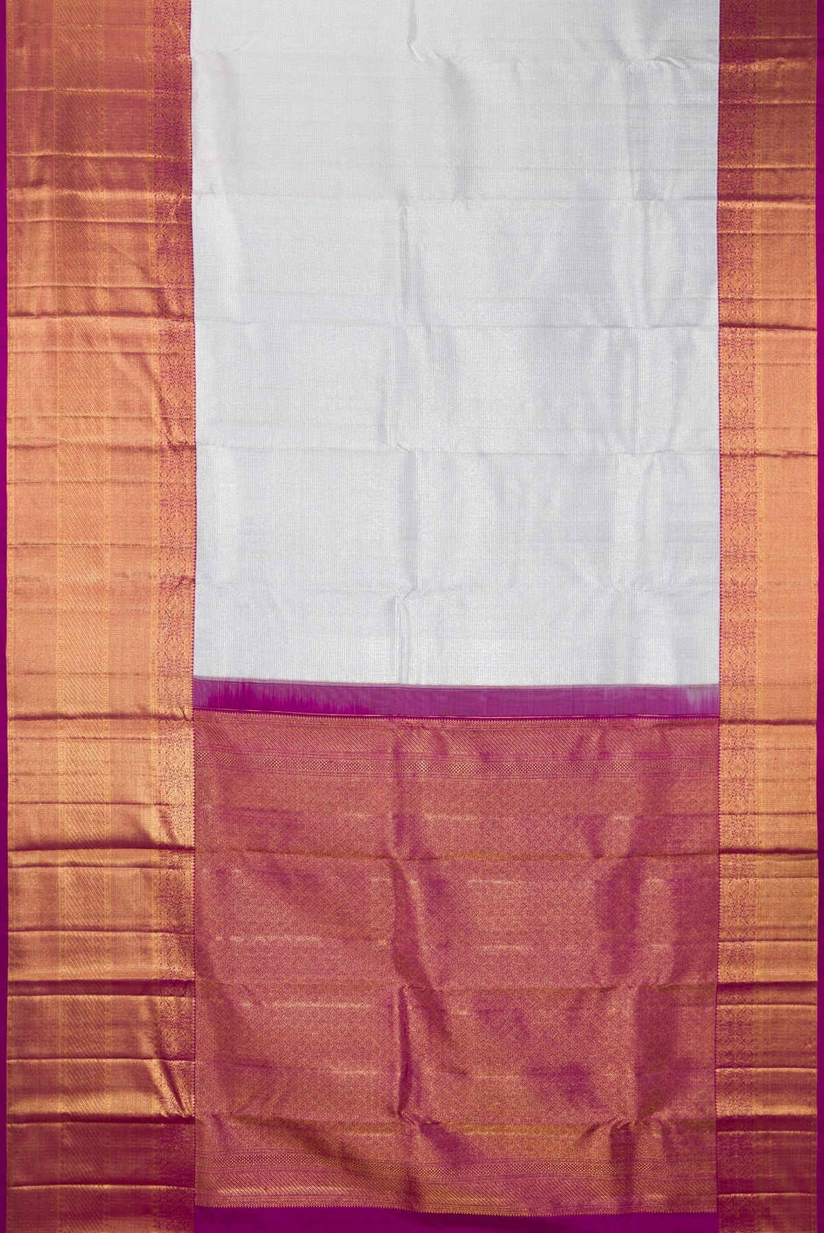 Flat view of Pure Silk Silver Kanchipuram Saree with Zari Brocade on the body and Zari Border. 