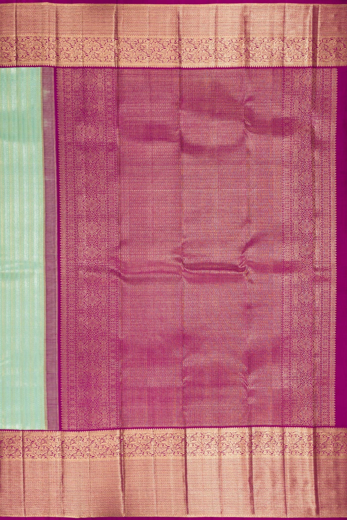 Close up image of the pallu of Pure Silk Pista Green Kanchipuram Saree with Zari Brocade on the body and Zari Border. 