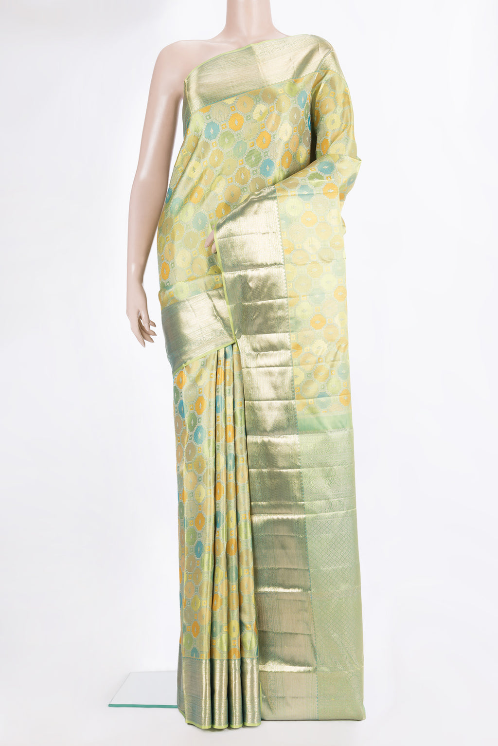 Pure Silk Pista Green Dual Tone Kanjivaram Saree with Zari Brocade on the body and Zari Border.  displayed on a mannequin