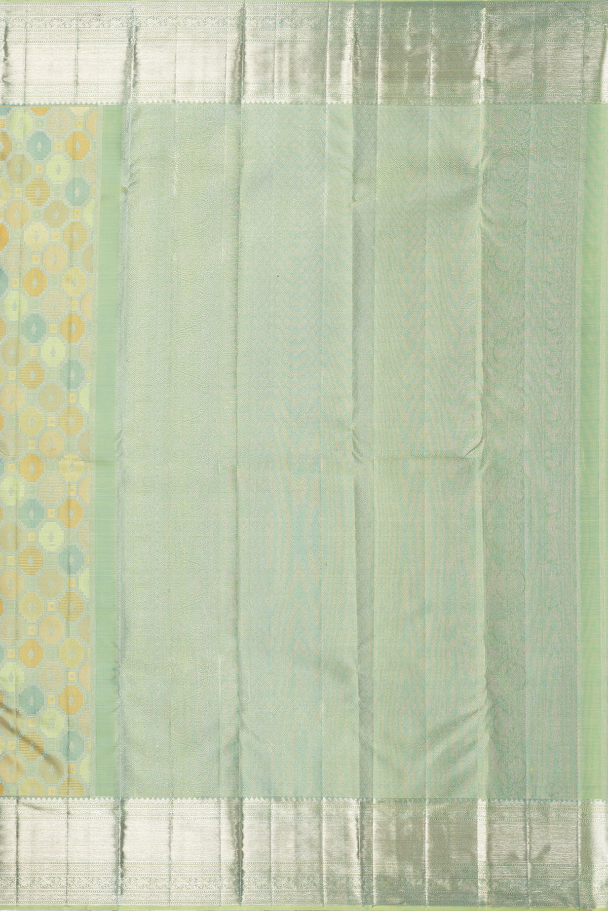 Close up image of the pallu of Pure Silk Pista Green Dual Tone Kanjivaram Saree with Zari Brocade on the body and Zari Border. 