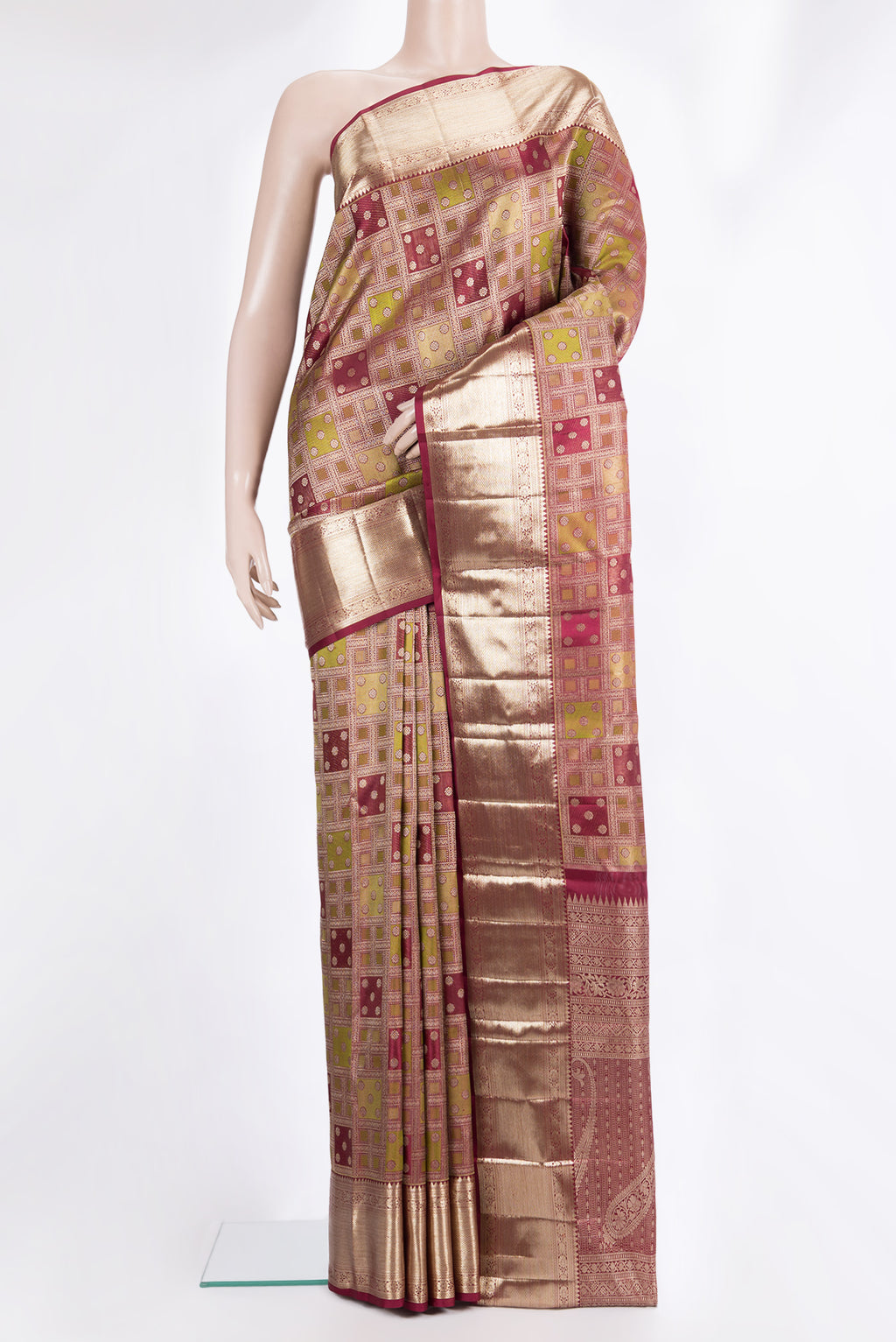 Pure Silk Maroon Kanjivaram Saree with Zari Brocade on the body and Zari Border.  displayed on a mannequin