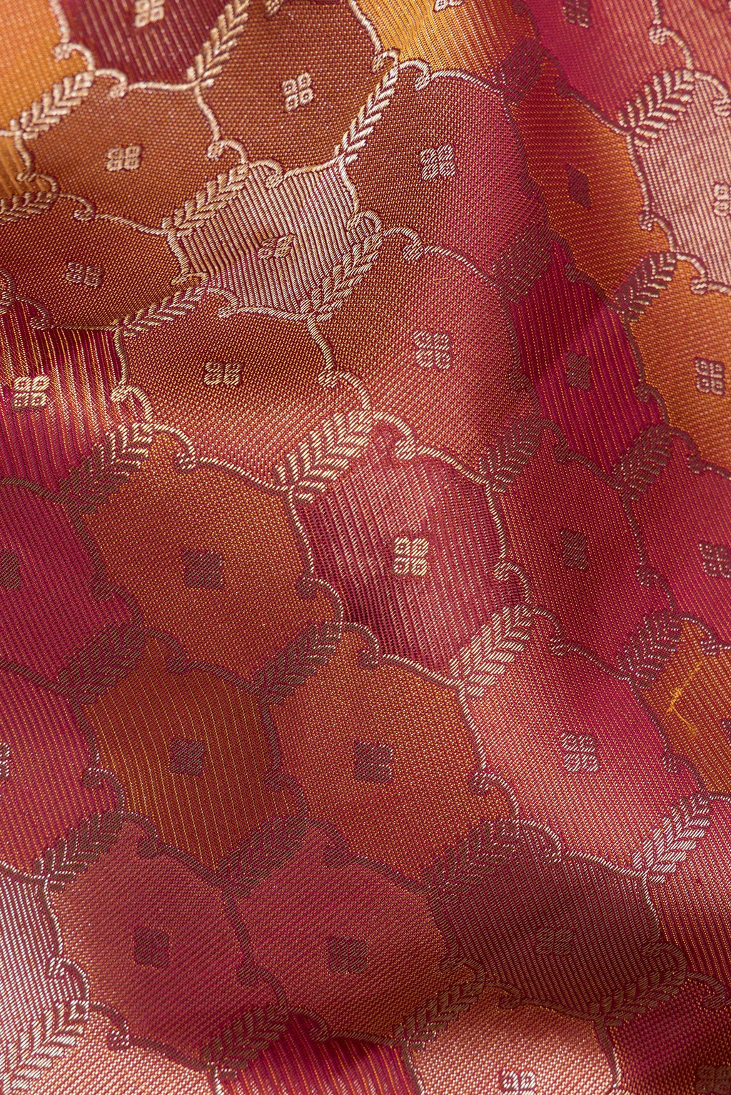 Close up of Pure Silk Maroon Kanjivaram Saree with Zari Brocade on the body and Zari Border.  displaying folds