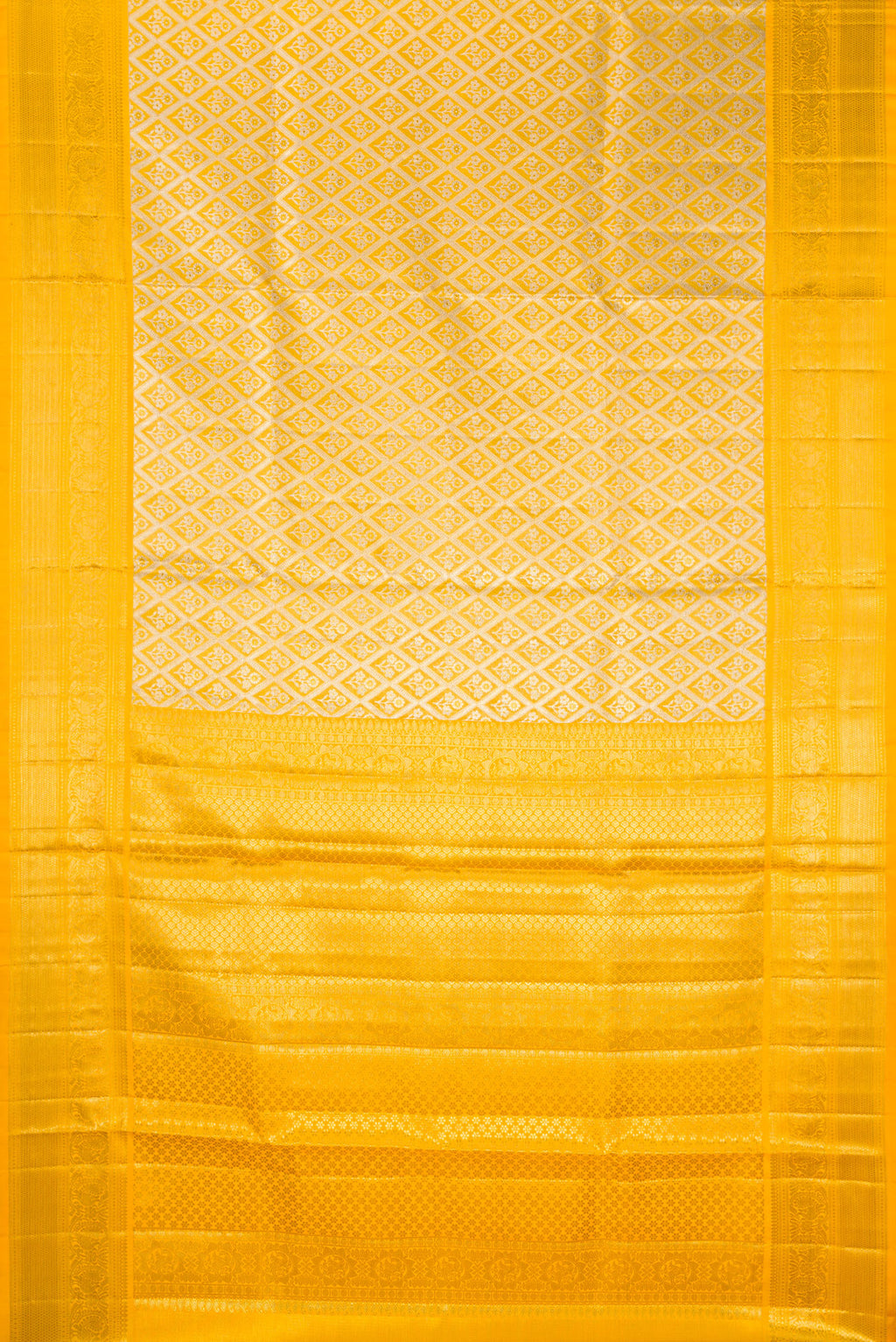 Flat view of Yellow Dual Tone Kanjivaram Tissue Saree with Zari Brocade on the body and Zari Border. 