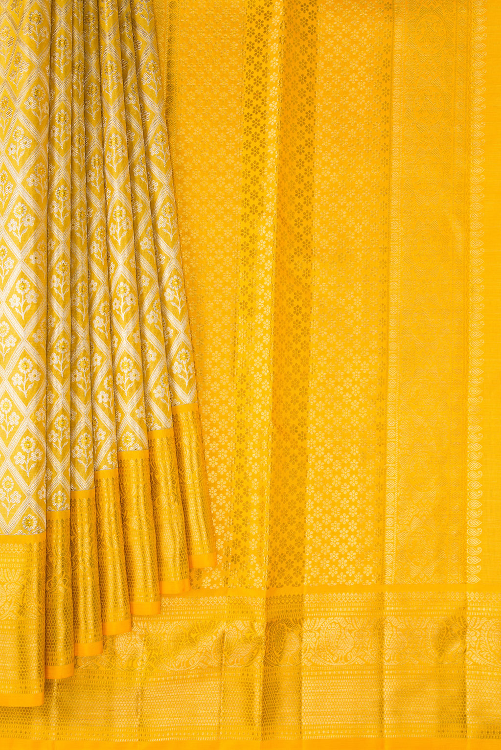 Pleats and pallu of Yellow Dual Tone Kanjivaram Tissue Saree with Zari Brocade on the body and Zari Border. 
