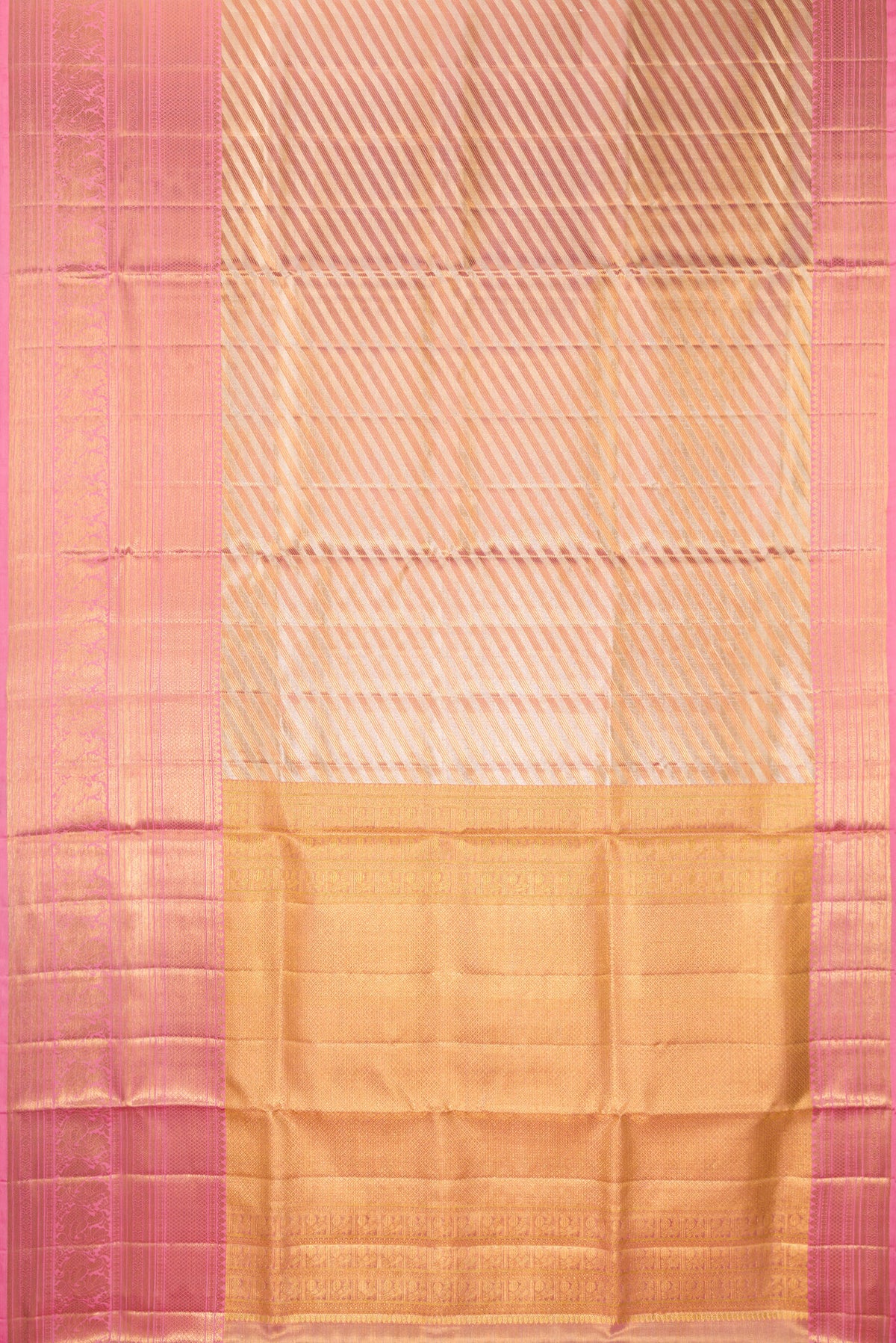 Flat view of Gold Dual Tone Kanjivaram Tissue Saree with Zari Brocade on the body and Fancy Border. 