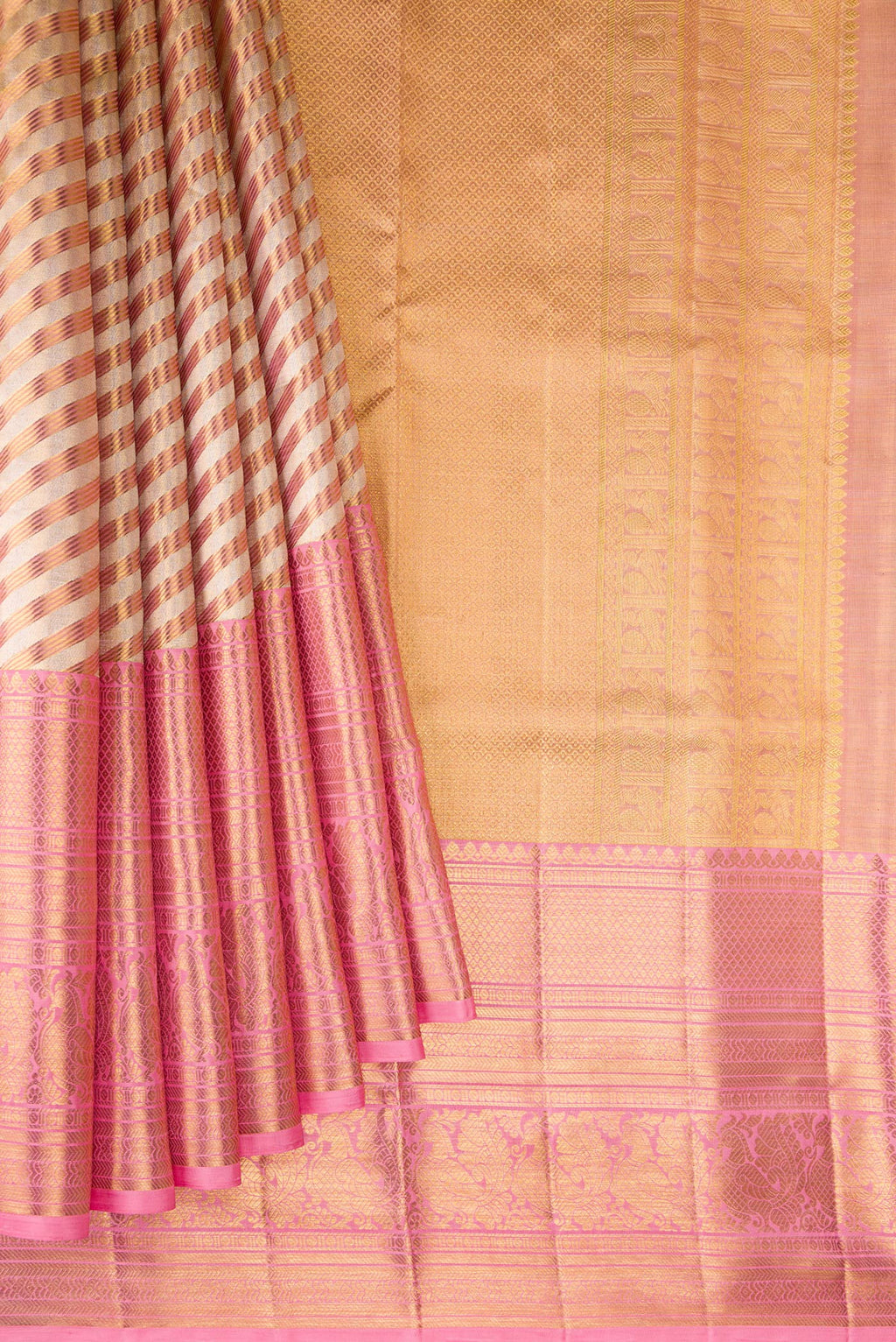 Pleats and pallu of Gold Dual Tone Kanjivaram Tissue Saree with Zari Brocade on the body and Fancy Border. 