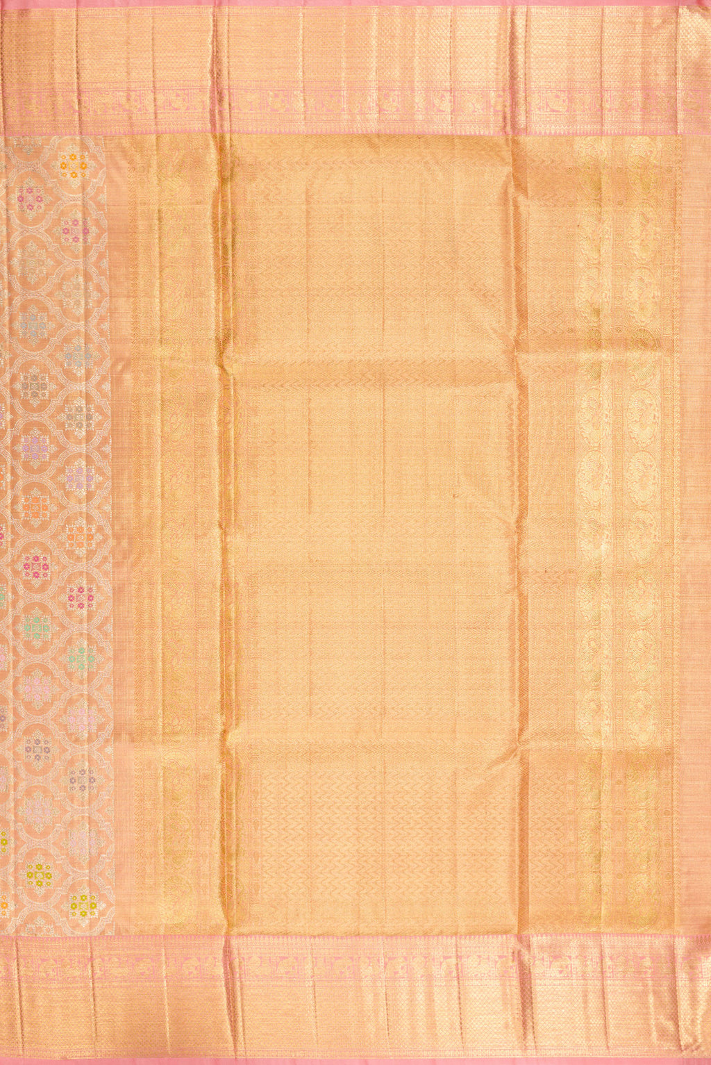Close up image of the pallu of Golden Peach Dual Tone Kanjivaram Tissue Saree with Zari Brocade on the body and Fancy Border. 