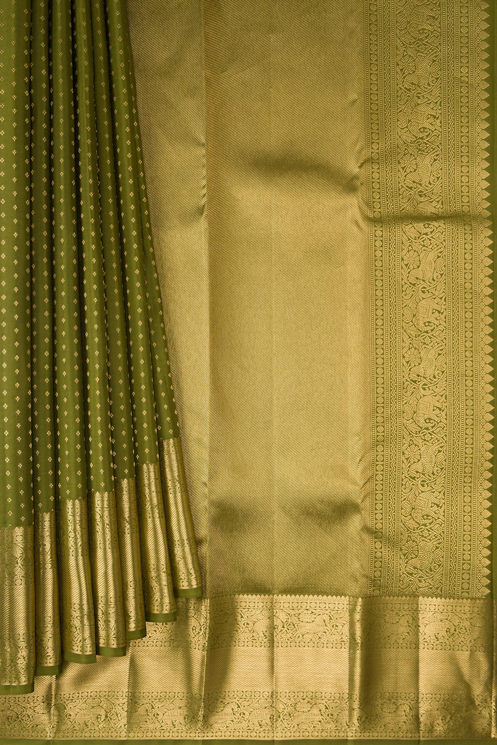 Pleats and pallu of Pure Silk Mehandi Green Kanjivaram Saree with Zari Butta on the body and Zari Border. 
