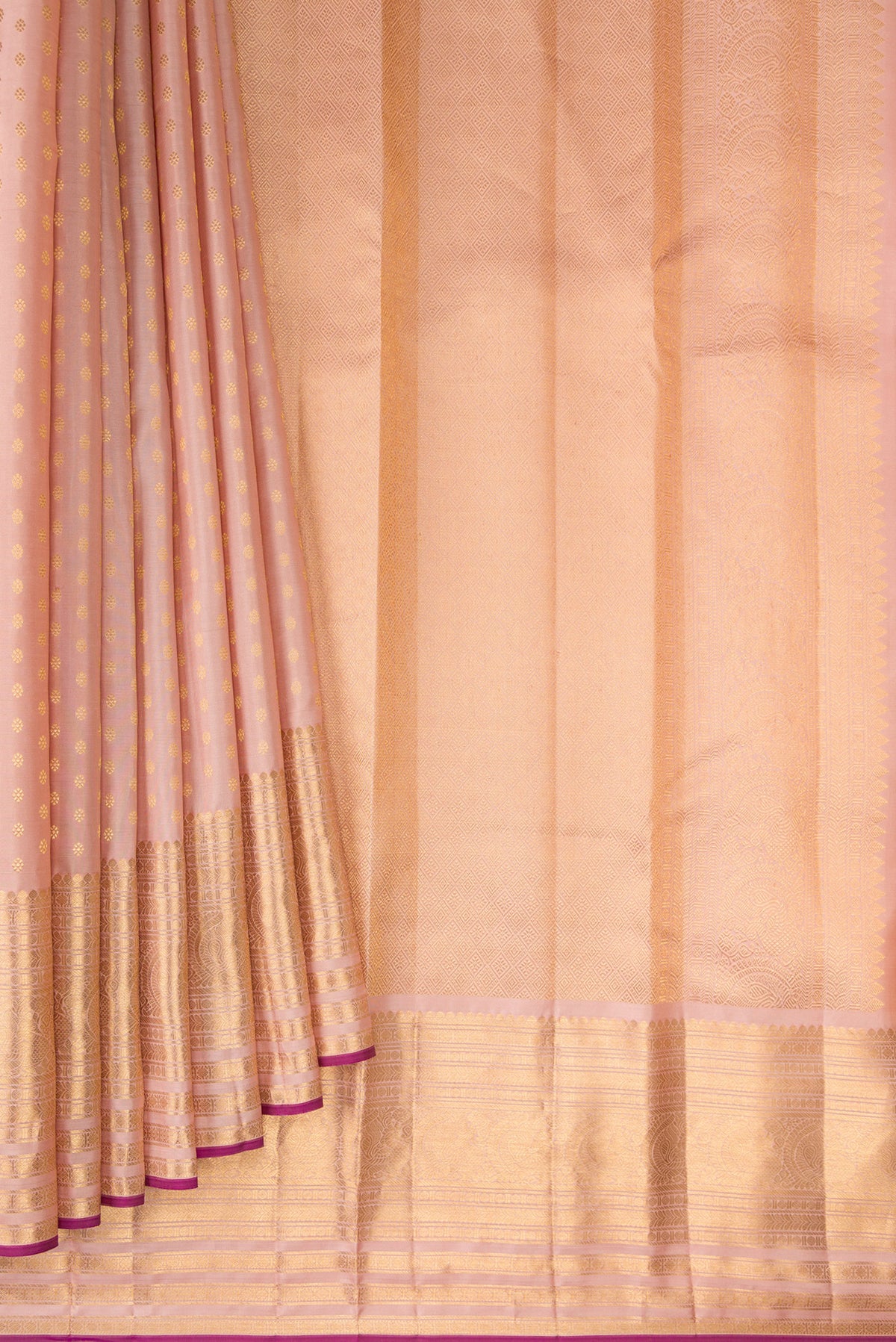 Pleats and pallu of Pure Silk Golden Peach Kanjivaram Saree with Zari Butta on the body and Zari Border. 
