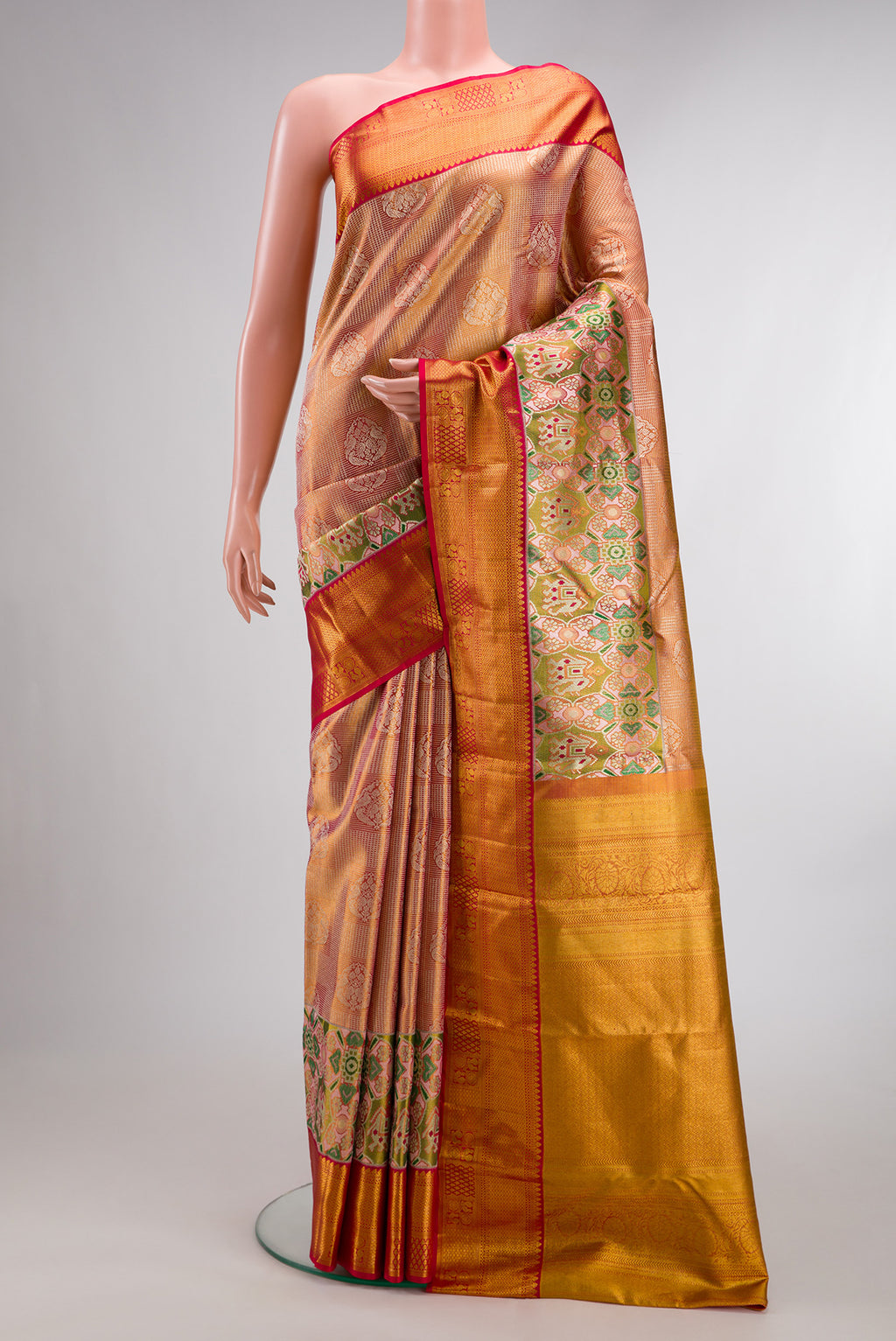 Red Dual Tone Kanjivaram Tissue Saree with Zari Brocade on the body and Fancy Border.  displayed on a mannequin