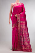 Pure Silk Pink Baluchari Saree with Zari And Thread Butta on the body and Zari And Thread Border.  displayed on a mannequin