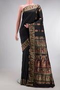 Pure Silk Black Baluchari Saree with Zari And Thread Butta on the body and Fancy Border.  displayed on a mannequin