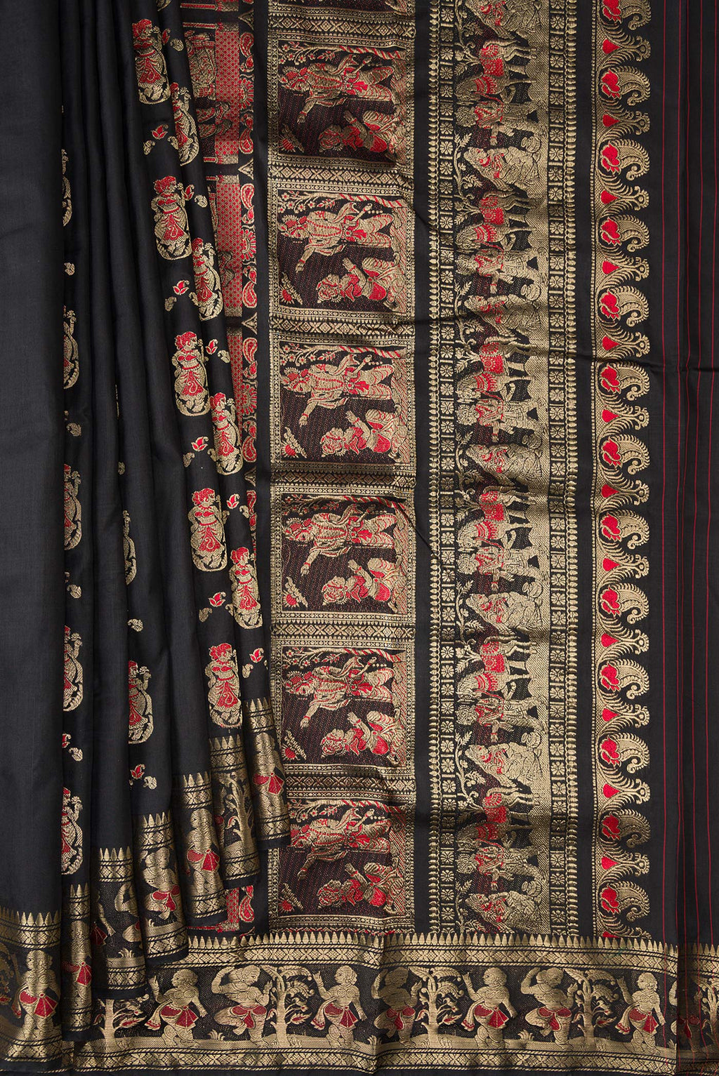 Pleats and pallu of Pure Silk Black Baluchari Saree with Zari And Thread Butta on the body and Fancy Border. 