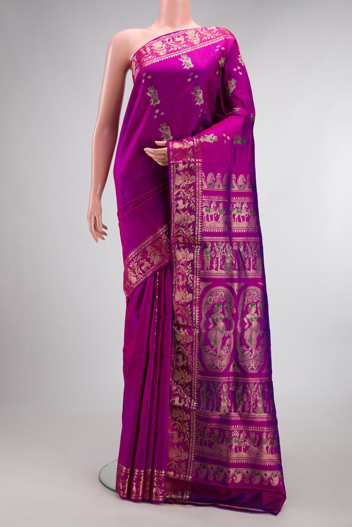 Pure Silk Magenta Baluchari Saree with Zari And Thread Butta on the body and Zari And Thread Border.  displayed on a mannequin