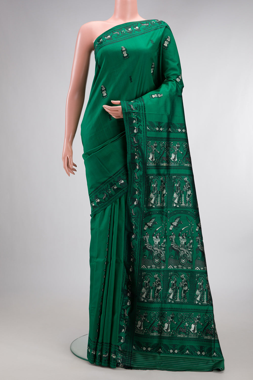 Pure Silk Green Baluchari Saree with Thread Butta on the body and Thread Border.  displayed on a mannequin