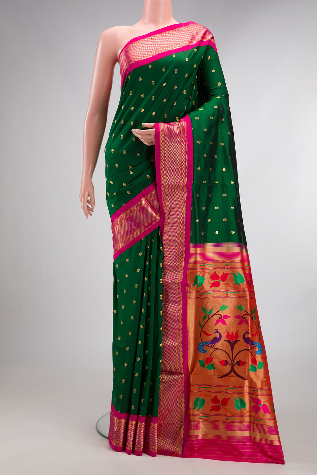 Pure Silk Bottle Green Paithani Saree with Zari Butta on the body and Zari Border.  displayed on a mannequin