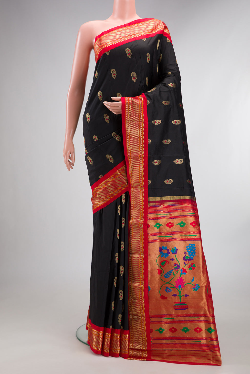 Pure Silk Black Dual Tone Paithani Saree with Zari And Thread Butta on the body and Zari Border.  displayed on a mannequin