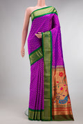 Pure Silk Purple Paithani Saree with Zari Butta on the body and Zari Border.  displayed on a mannequin