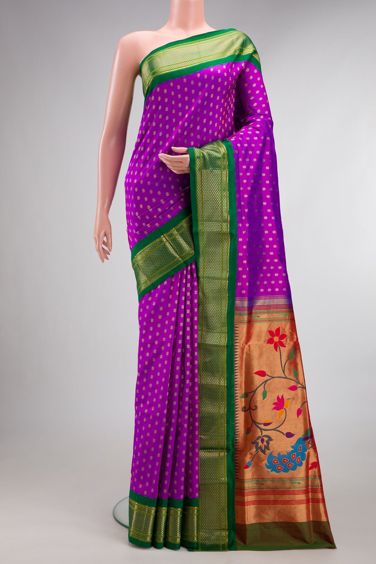 Pure Silk Purple Paithani Saree with Zari Butta on the body and Zari Border.  displayed on a mannequin