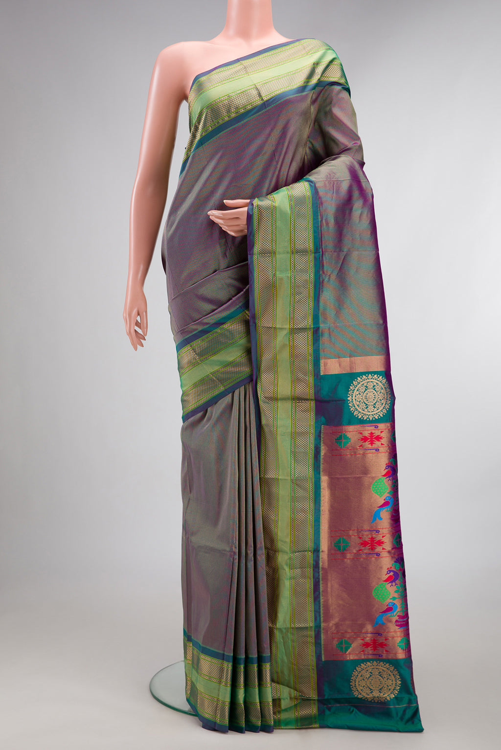 Pure Silk Purple Dual Tone Paithani Saree with Stripes on the body and Fancy Border.  displayed on a mannequin