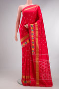 Pure Silk Red Pochampally Saree with Ikat design on the body and Ikat Border.  displayed on a mannequin