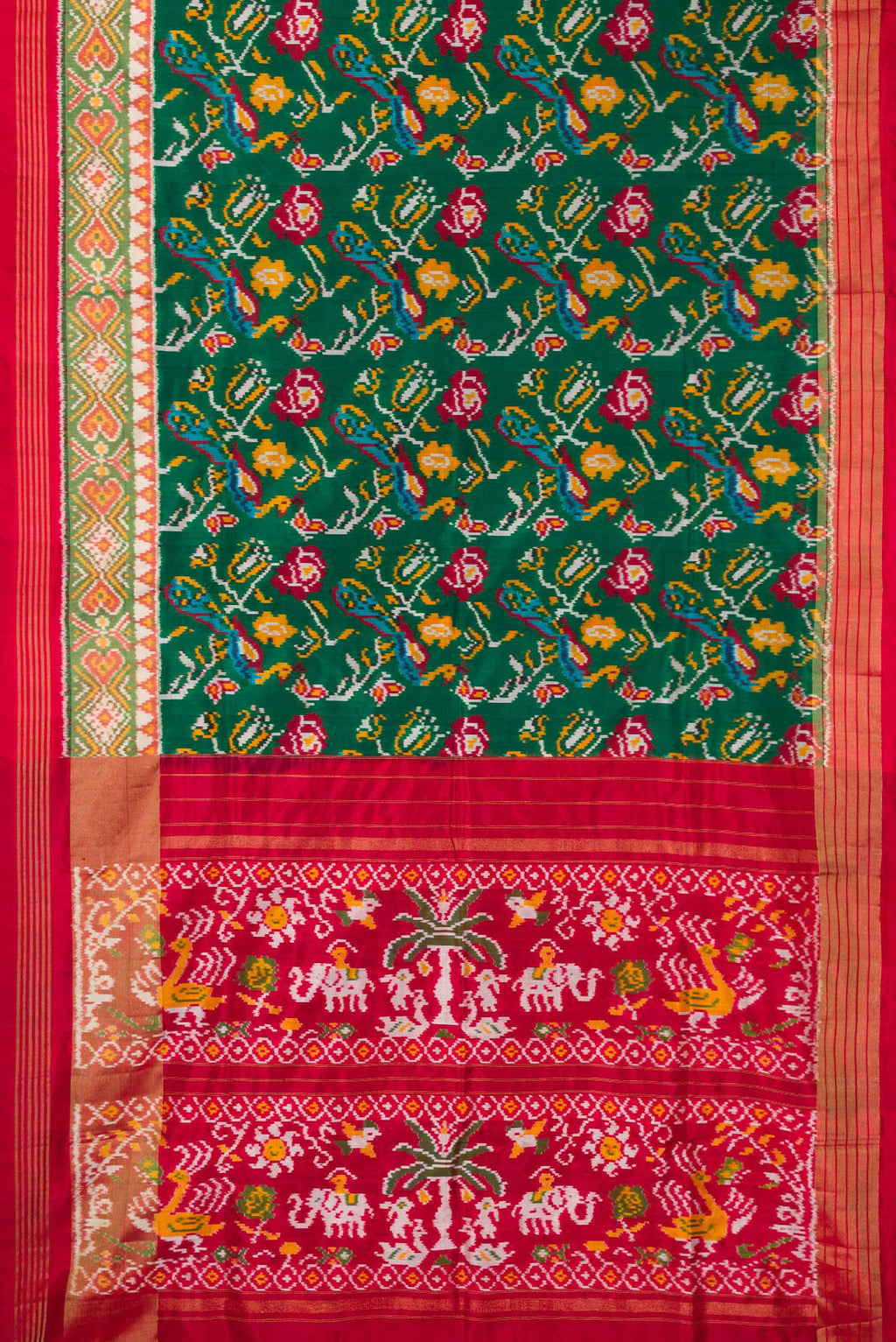 Flat view of Pure Silk Bottle Green Dual Tone Double Ikat Saree with Ikat Print on the body and Ikat Border. 
