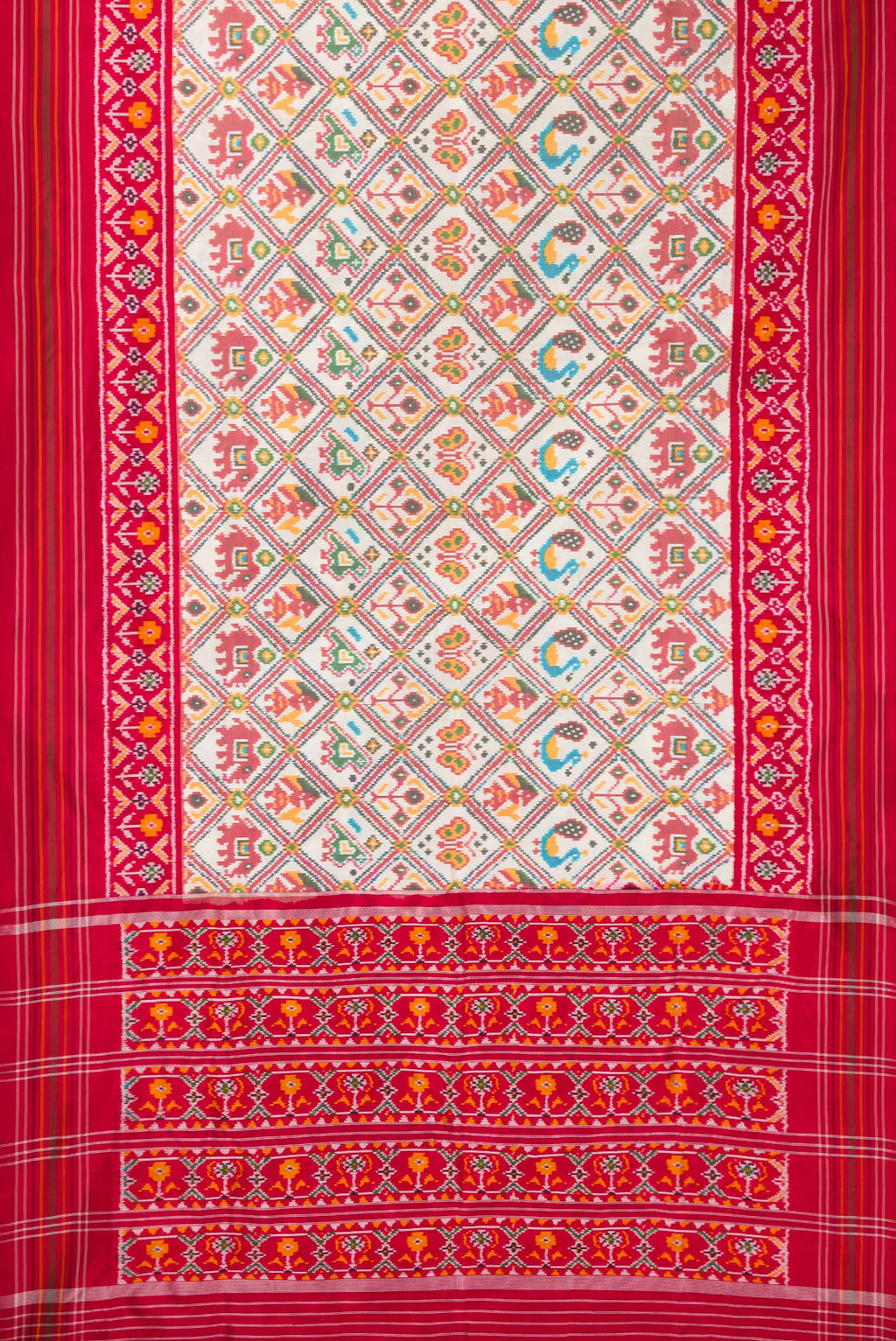 Flat view of Pure Silk Off White Pochampally Saree with Pure Ikat on the body and Ikat Border. 
