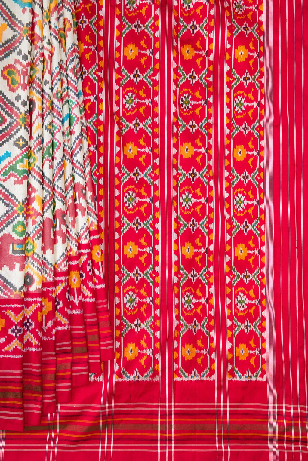 Pleats and pallu of Pure Silk Off White Pochampally Saree with Pure Ikat on the body and Ikat Border. 
