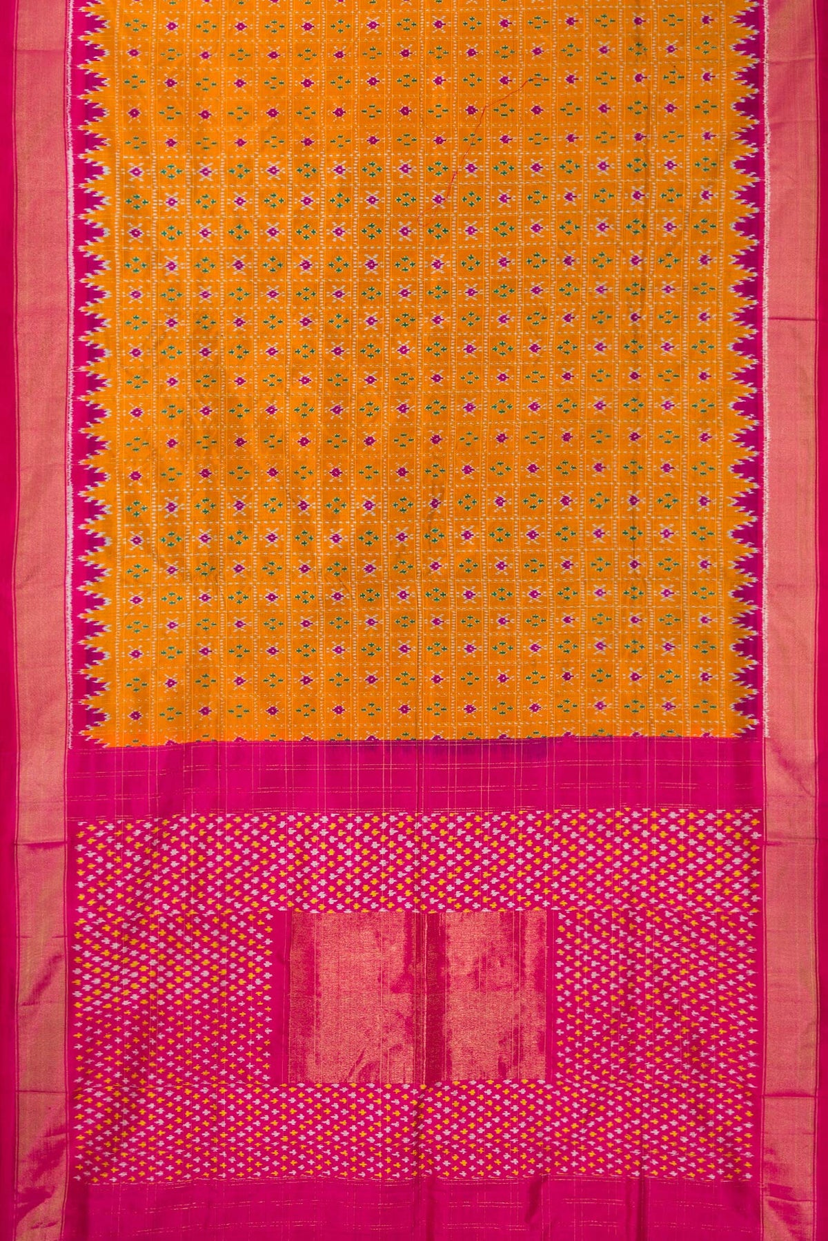 Flat view of Pure Silk Mustard Pochampally Saree with Pure Ikat on the body and Ikat Border. 