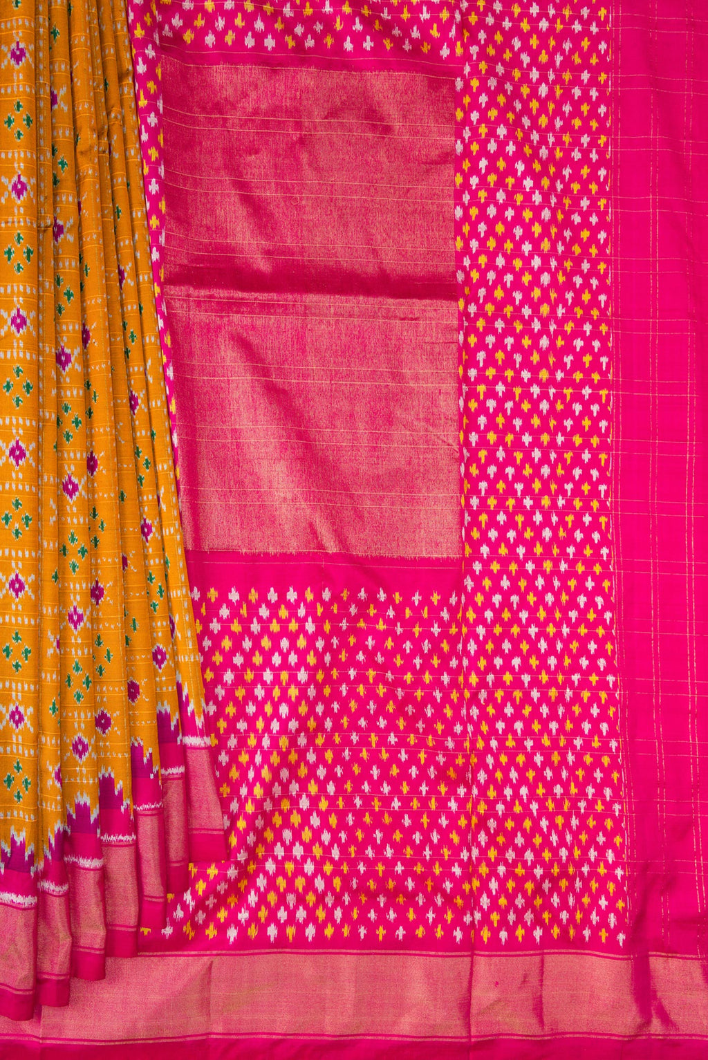 Pleats and pallu of Pure Silk Mustard Pochampally Saree with Pure Ikat on the body and Ikat Border. 