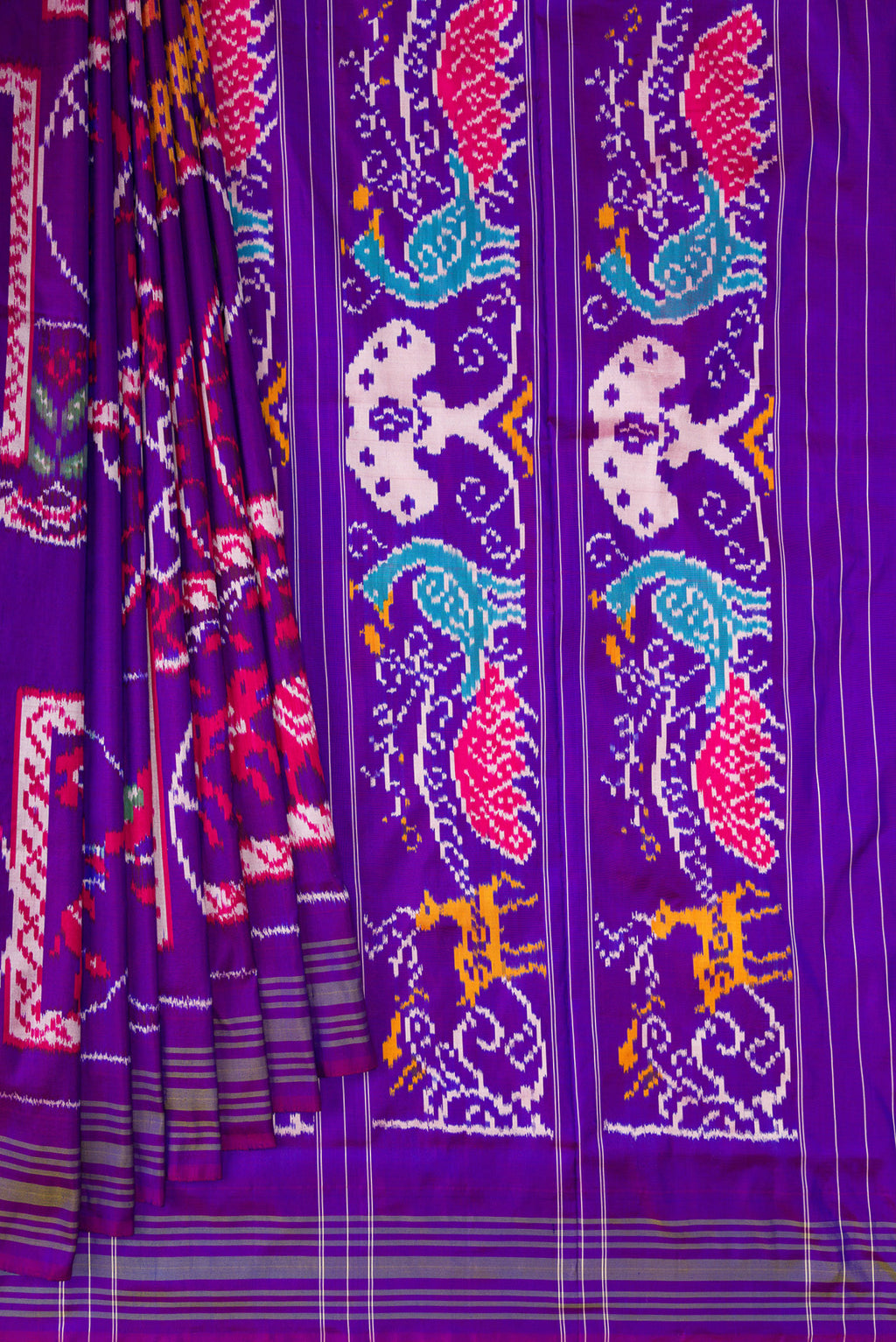 Pleats and pallu of Pure Silk Purple Pochampally Saree with Pure Ikat on the body and Ikat Border. 