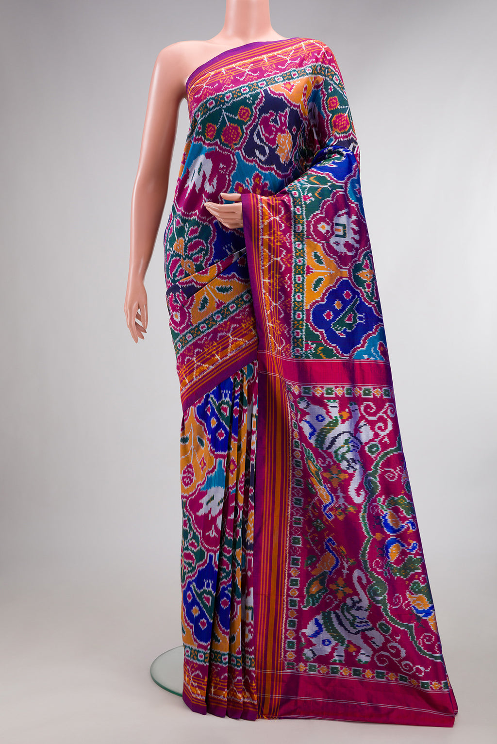 Pure Silk Multi Color Pochampally Saree with Pure Ikat on the body and Ikat Border.  displayed on a mannequin