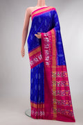 Pure Silk Royal Blue Pochampally Saree with Pure Ikat on the body and Ikat Border.  displayed on a mannequin