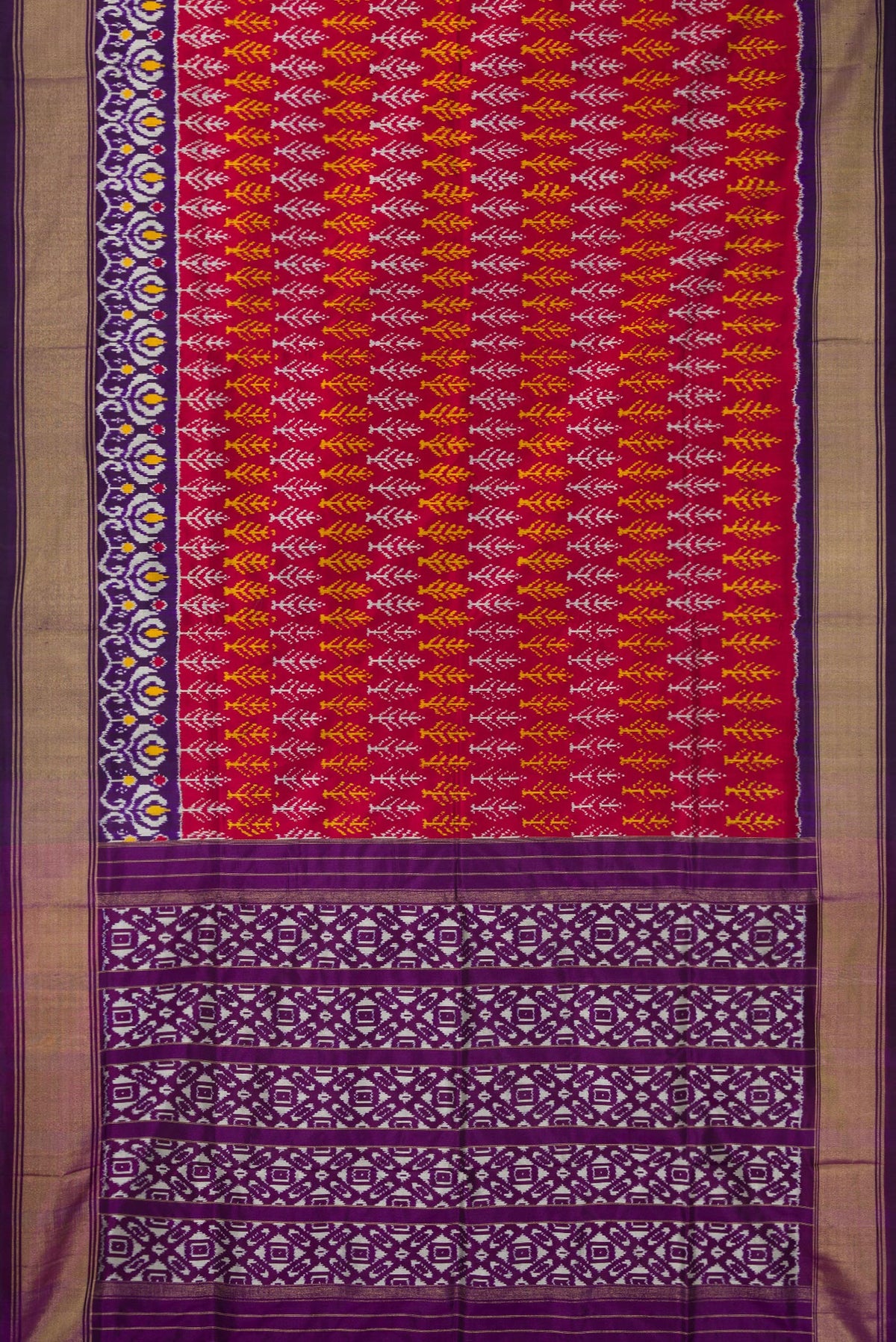 Flat view of Pure Silk Deep Red Pochampally Saree with Pure Ikat on the body and Ikat Border. 