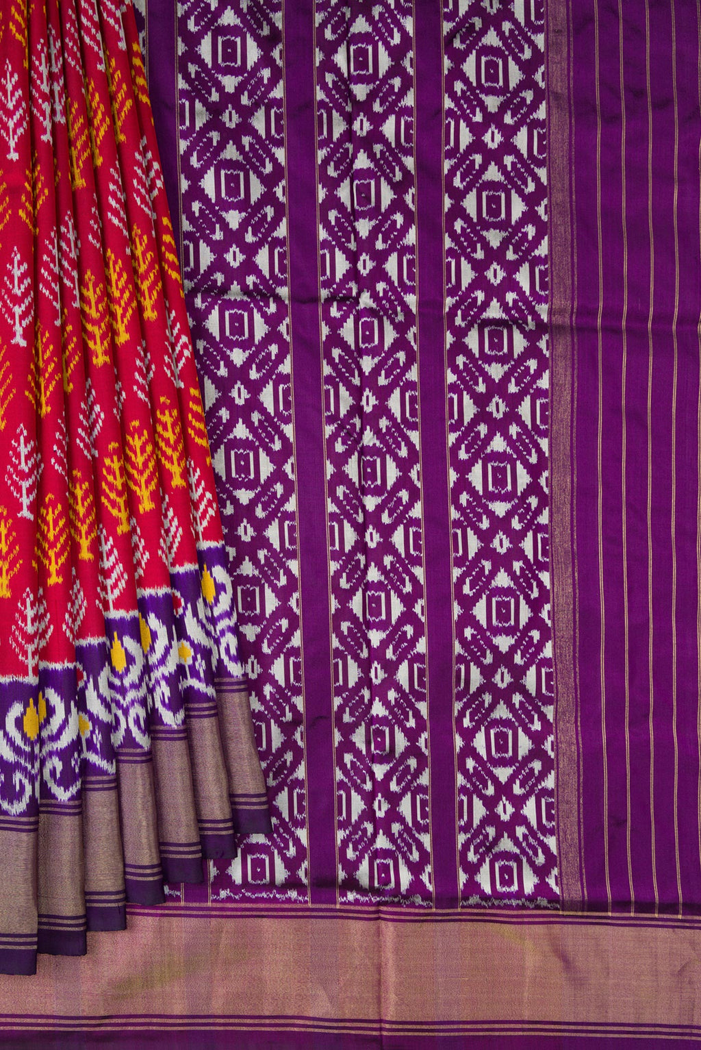 Pleats and pallu of Pure Silk Deep Red Pochampally Saree with Pure Ikat on the body and Ikat Border. 