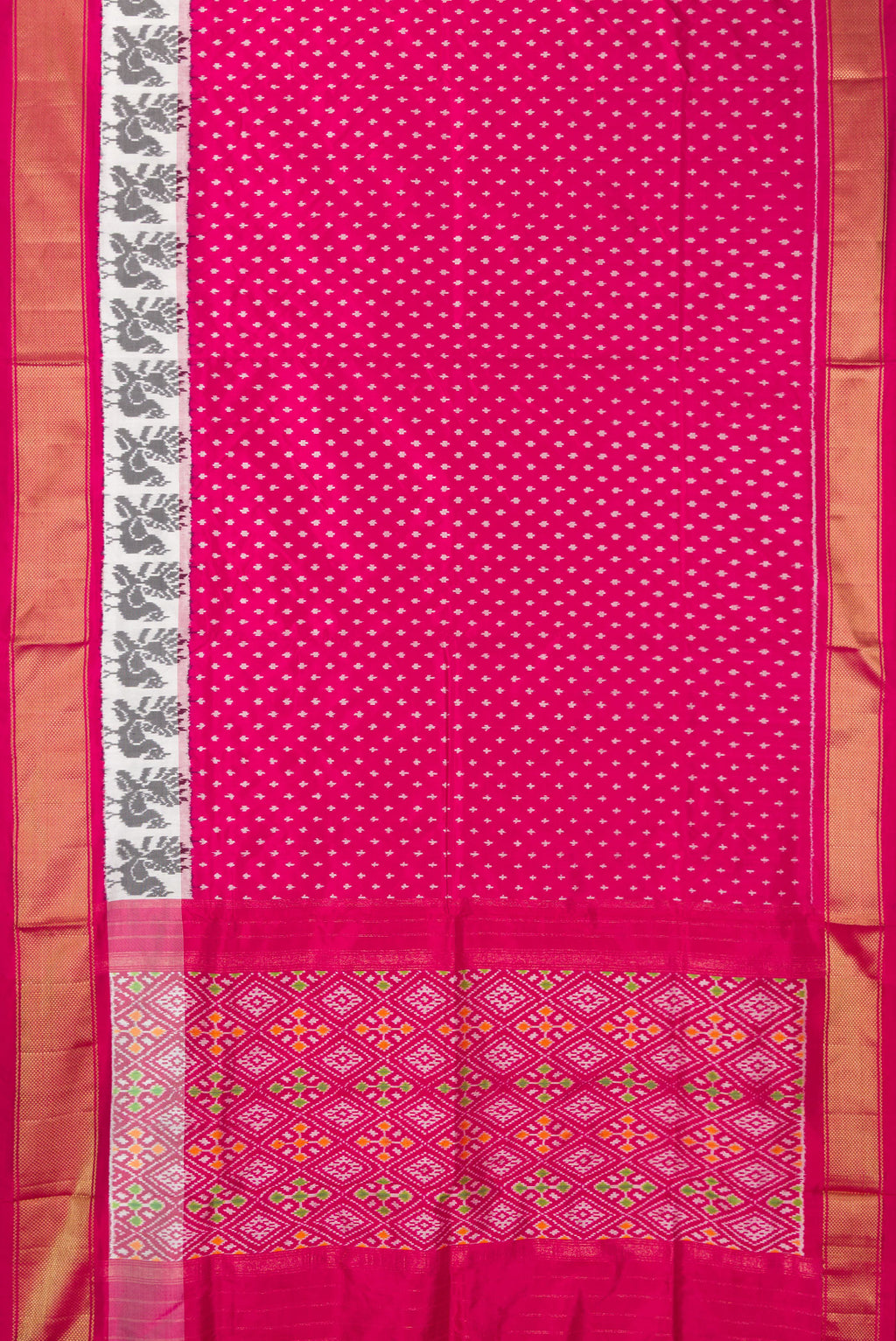Flat view of Pure Silk Dark Pink Pochampally Saree with Pure Ikat on the body and Ikat Border. 