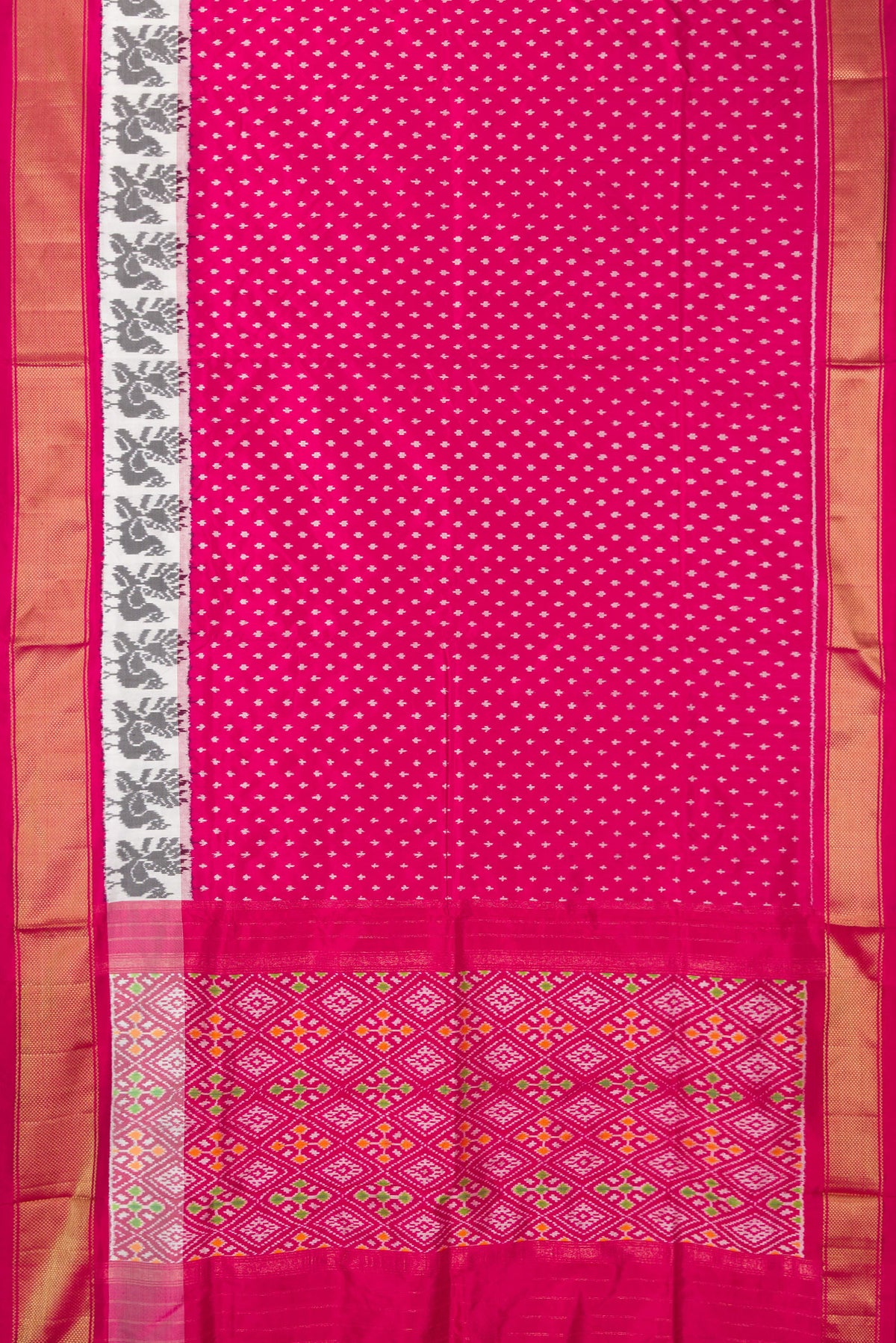 Flat view of Pure Silk Dark Pink Pochampally Saree with Pure Ikat on the body and Ikat Border. 