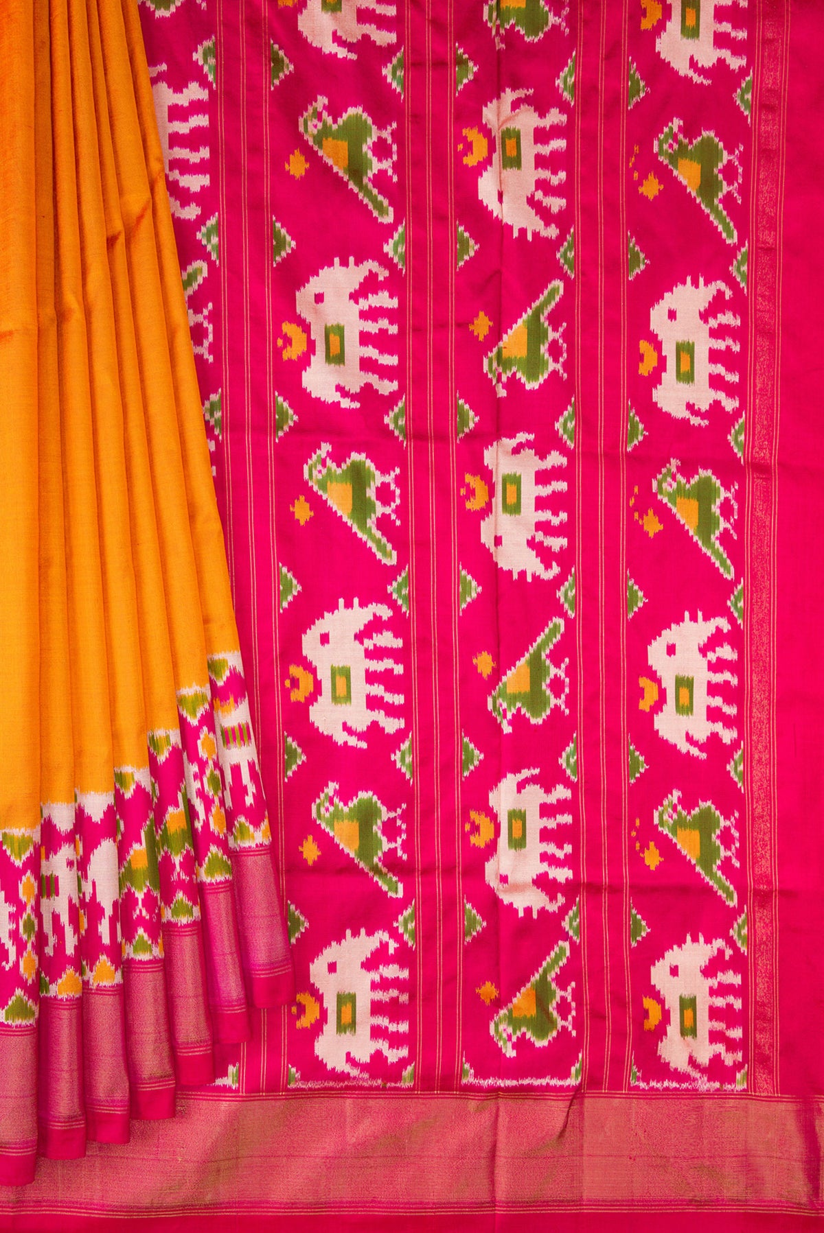 Pleats and pallu of Pure Silk Orange Dual Tone Double Ikat Saree with Plain Body and Ikat Border. 